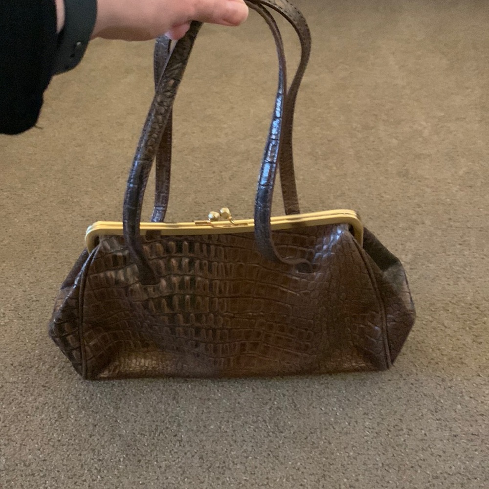 Clasp brown faux reptile handbag